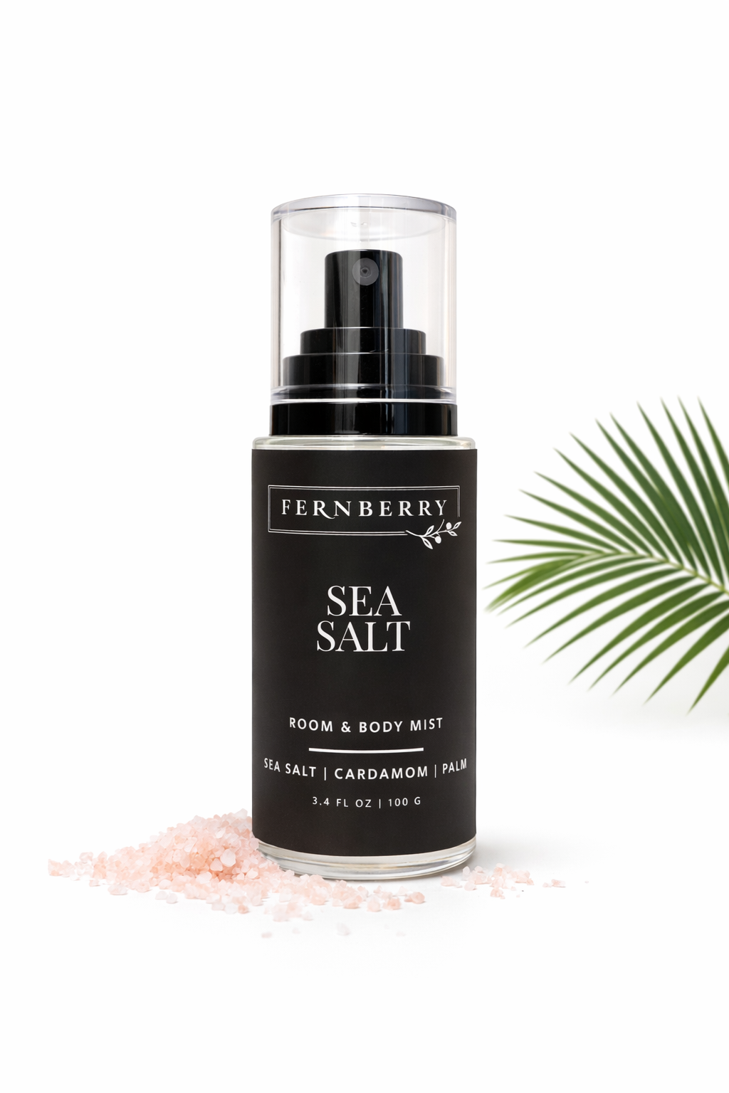 Fernberry Sea Salt room and body mist with palm leaf on a white background