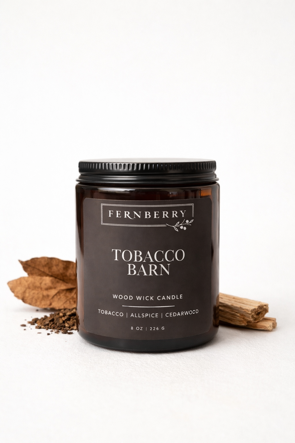 Fernberry Tobacco Barn candle with wood wick on a white background