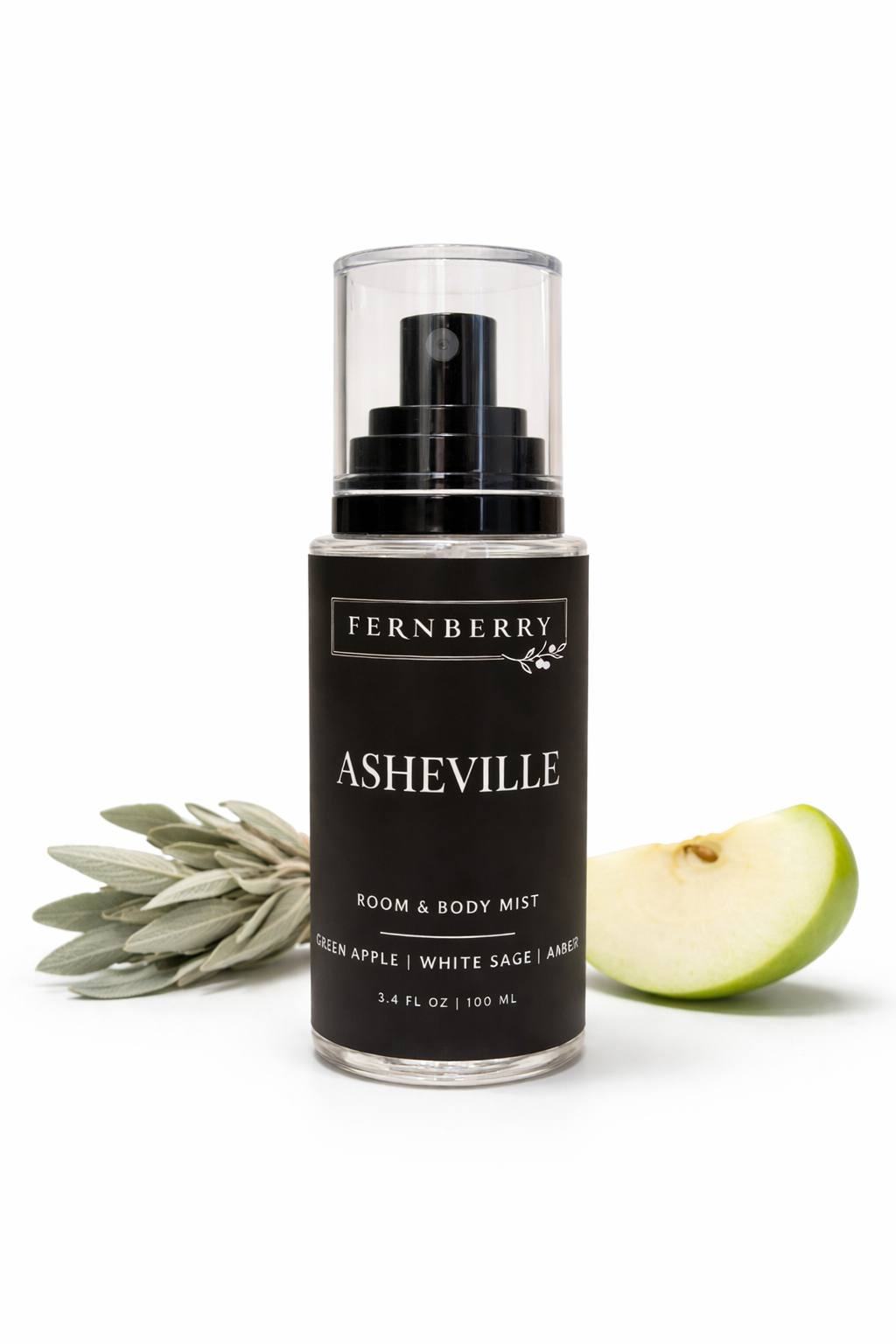 Fernberry Asheville room & body mist bottle with green apple and leaf on a white background